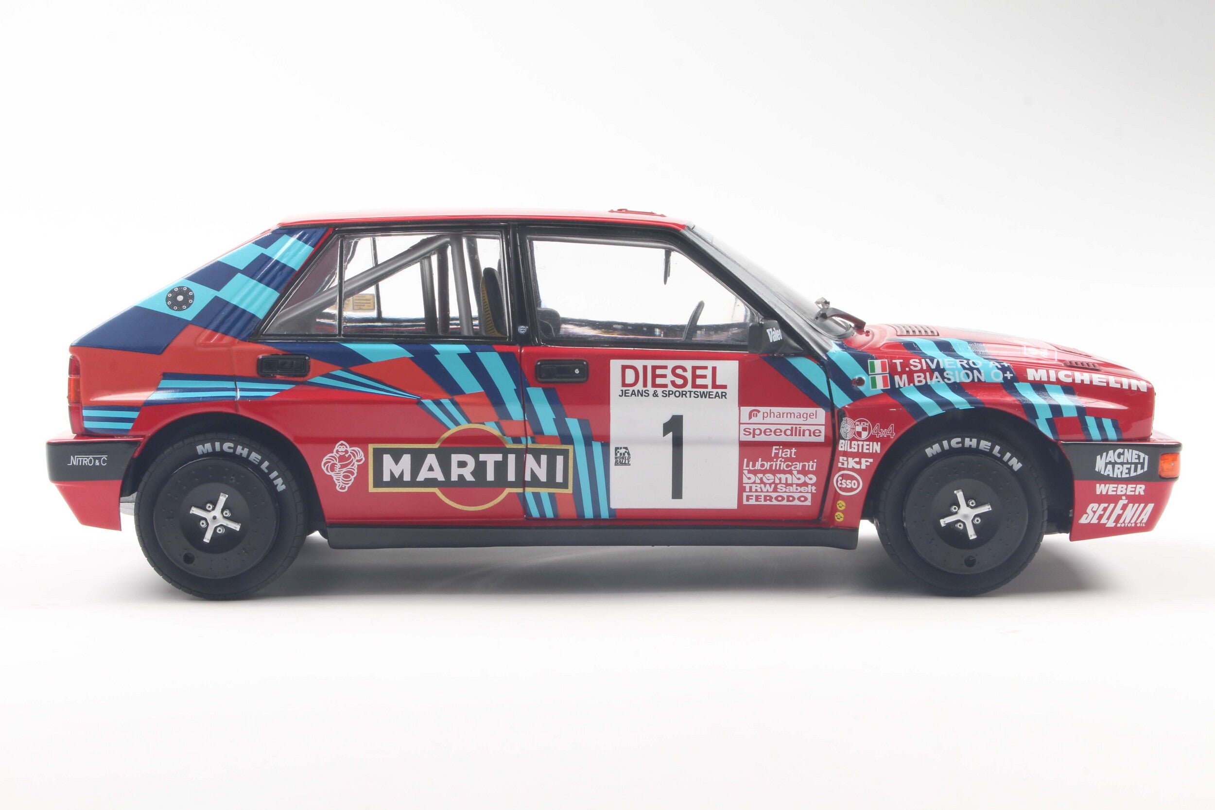 SOLIDO 1807808 MINIATURE LANCIA DELTA HF INTEGRALE RED N1 M.BIASION /
T.SIVIERO RALLY SAN 1/18