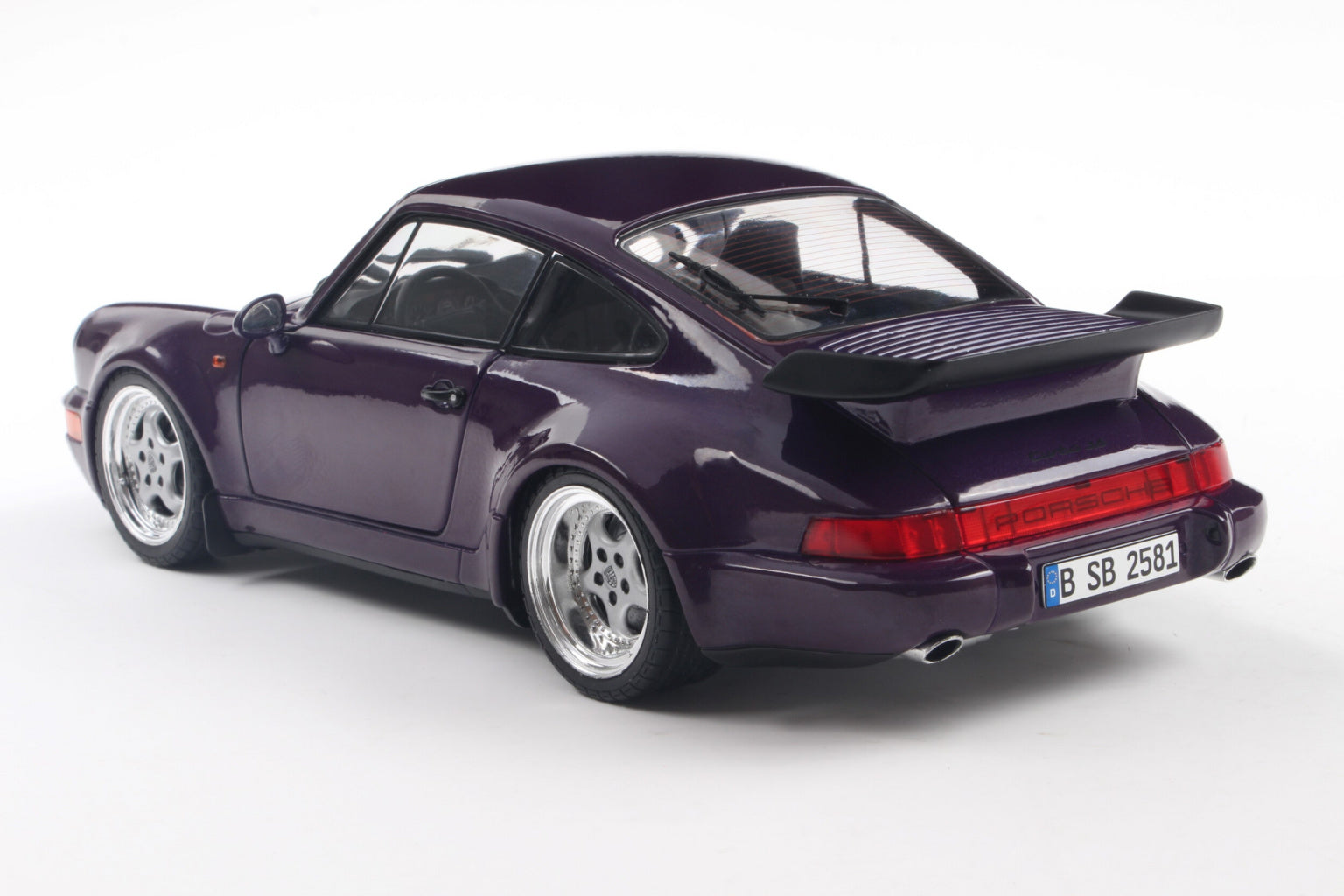 SOLIDO 1803412 MINIATURE PORSCHE 911 (964) TURBO VIOLET BLUE METALLIC
1990 1/18