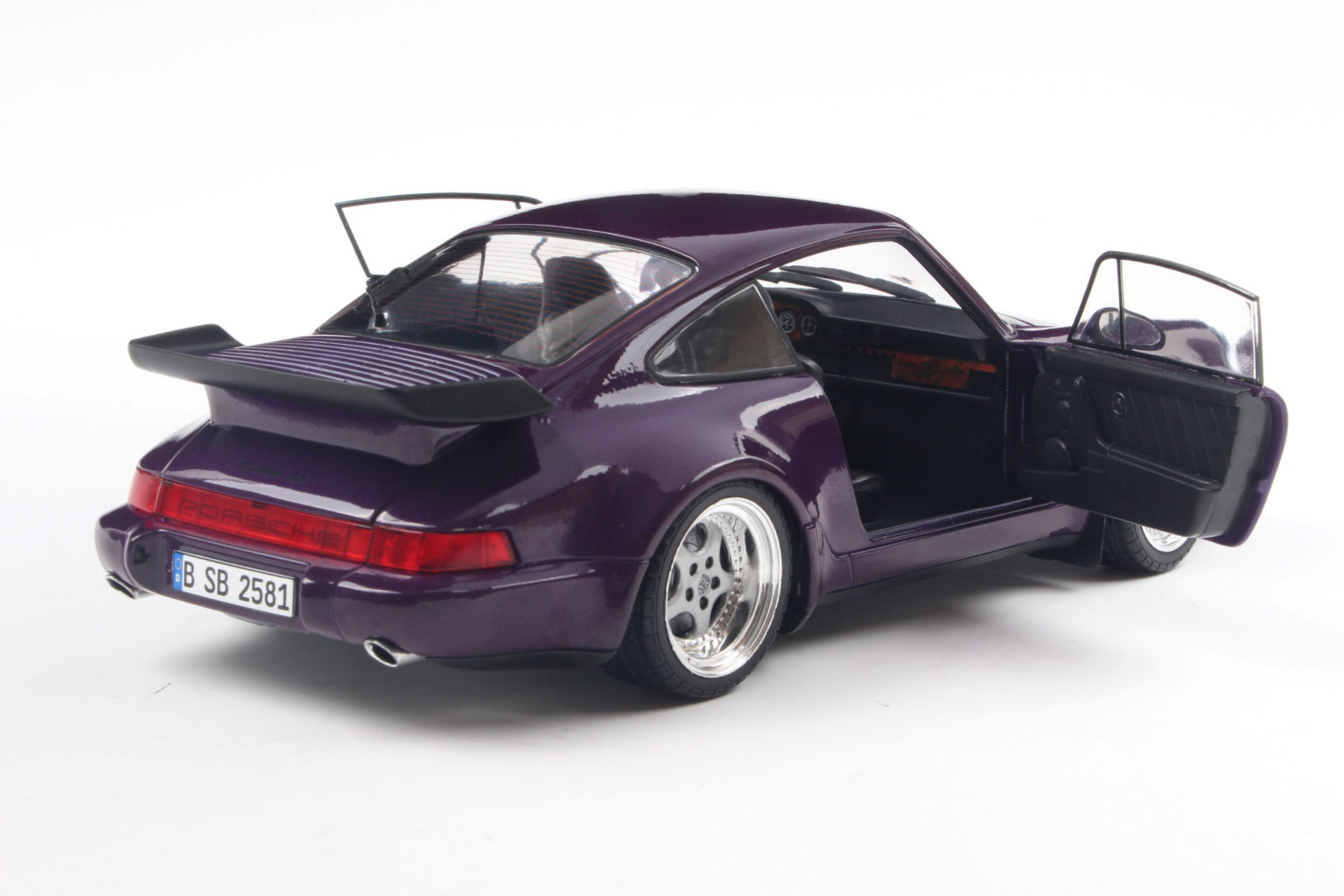 SOLIDO 1803412 MINIATURE PORSCHE 911 (964) TURBO VIOLET BLUE METALLIC
1990 1/18