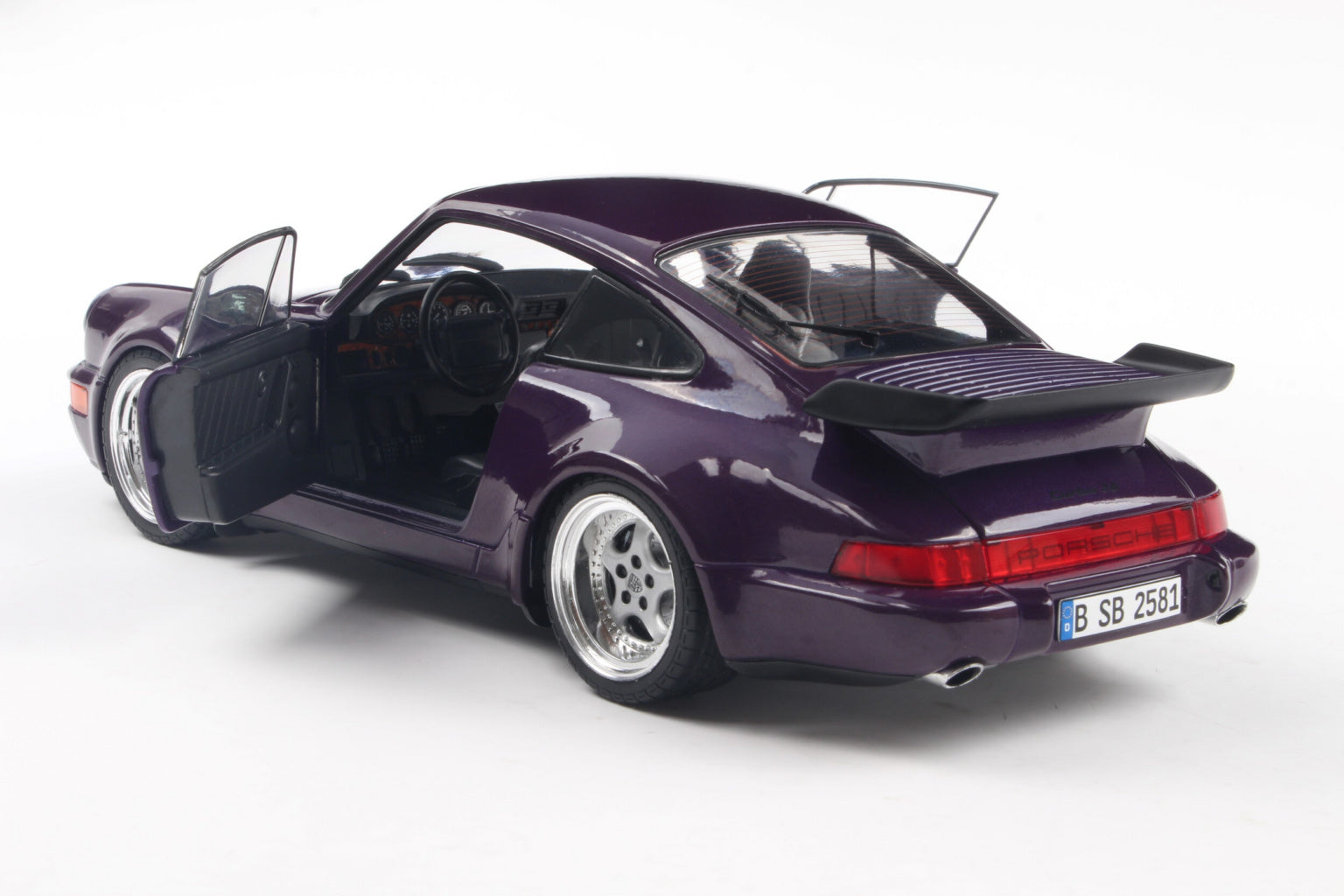 SOLIDO 1803412 MINIATURE PORSCHE 911 (964) TURBO VIOLET BLUE METALLIC
1990 1/18