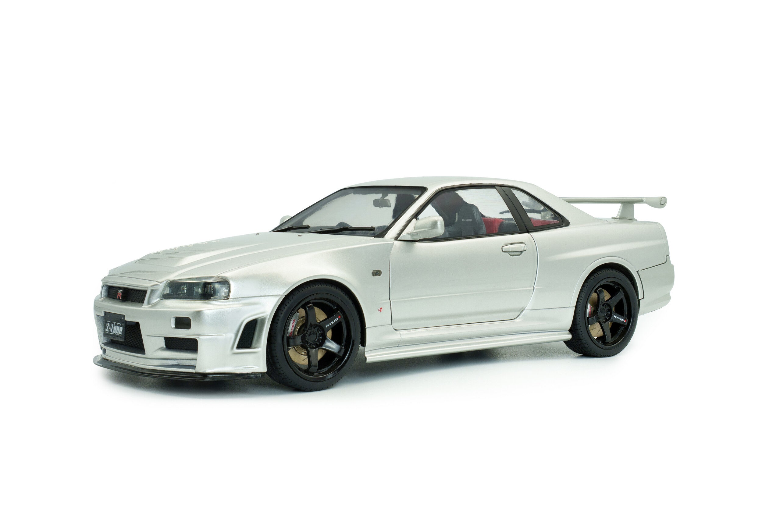 SOLIDO 1804312 MINIATURE NISSAN SKYLINE GT-R (BNR34) WITH NISMO PARTS SILVER 1999 1/18