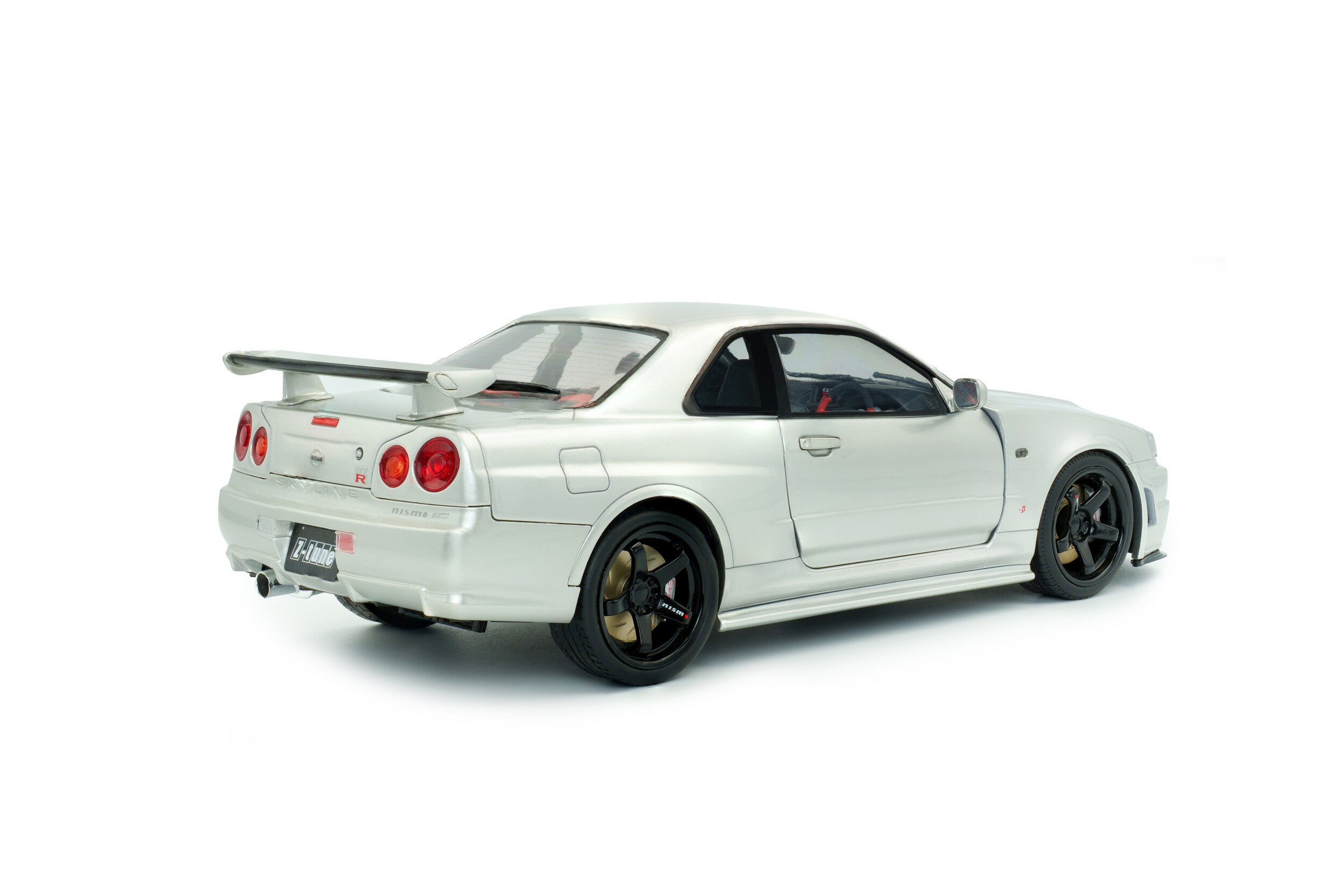 SOLIDO 1804312 MINIATURE NISSAN SKYLINE GT-R (BNR34) WITH NISMO PARTS SILVER 1999 1/18